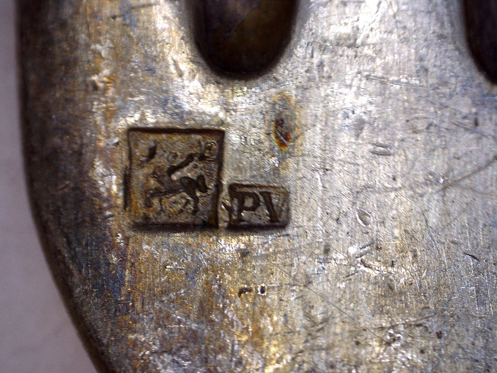 Poinçon métal argenté marque Ercuis 1