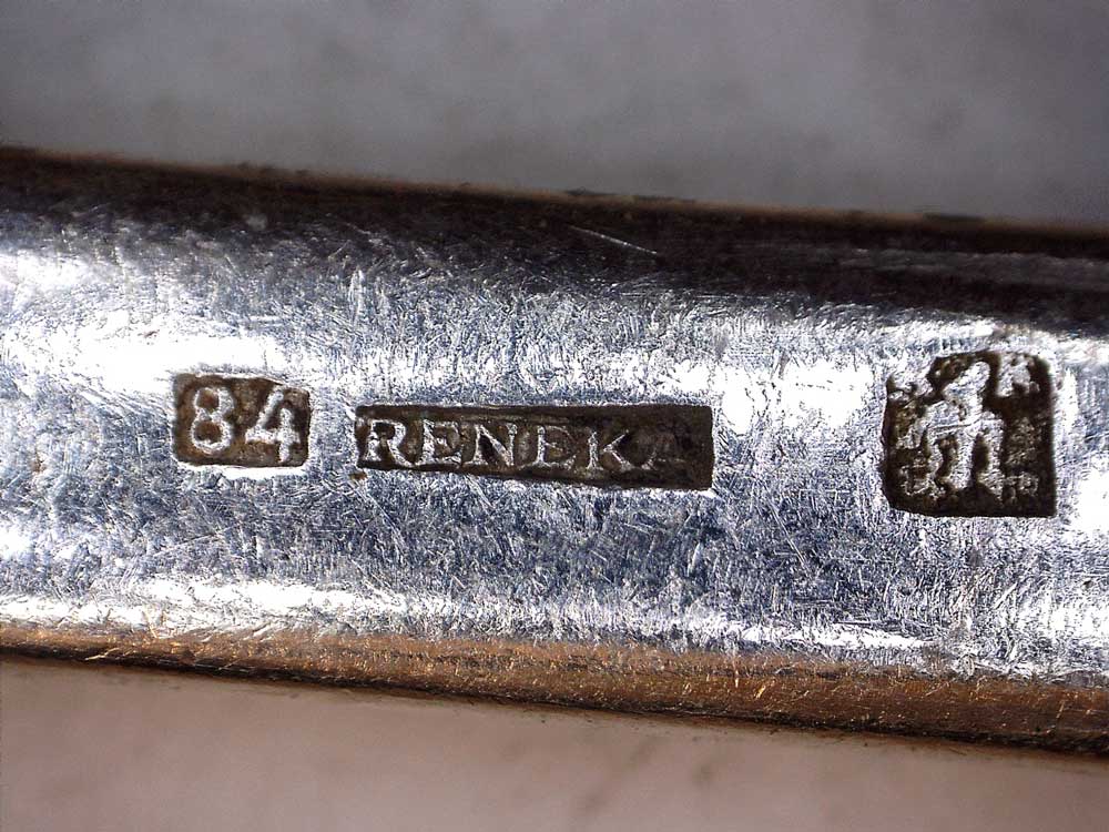 Poinçon métal argenté marque Reneka 1